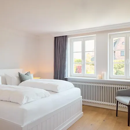 Reethues Mit Kamin Und Suedgarten In Direkter Wattnaehe Сasa de vacaciones *